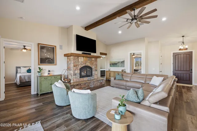 a bedroom with a bed and a chair