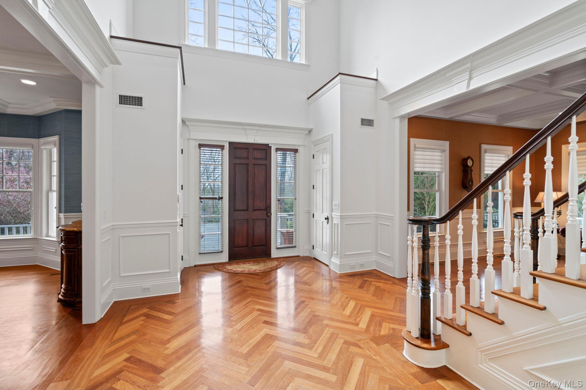 280 Southdown Road Lloyd Harbor, NY 11743 - Photo 4 of 39 a view of livingroom with hardwood floor and hallway