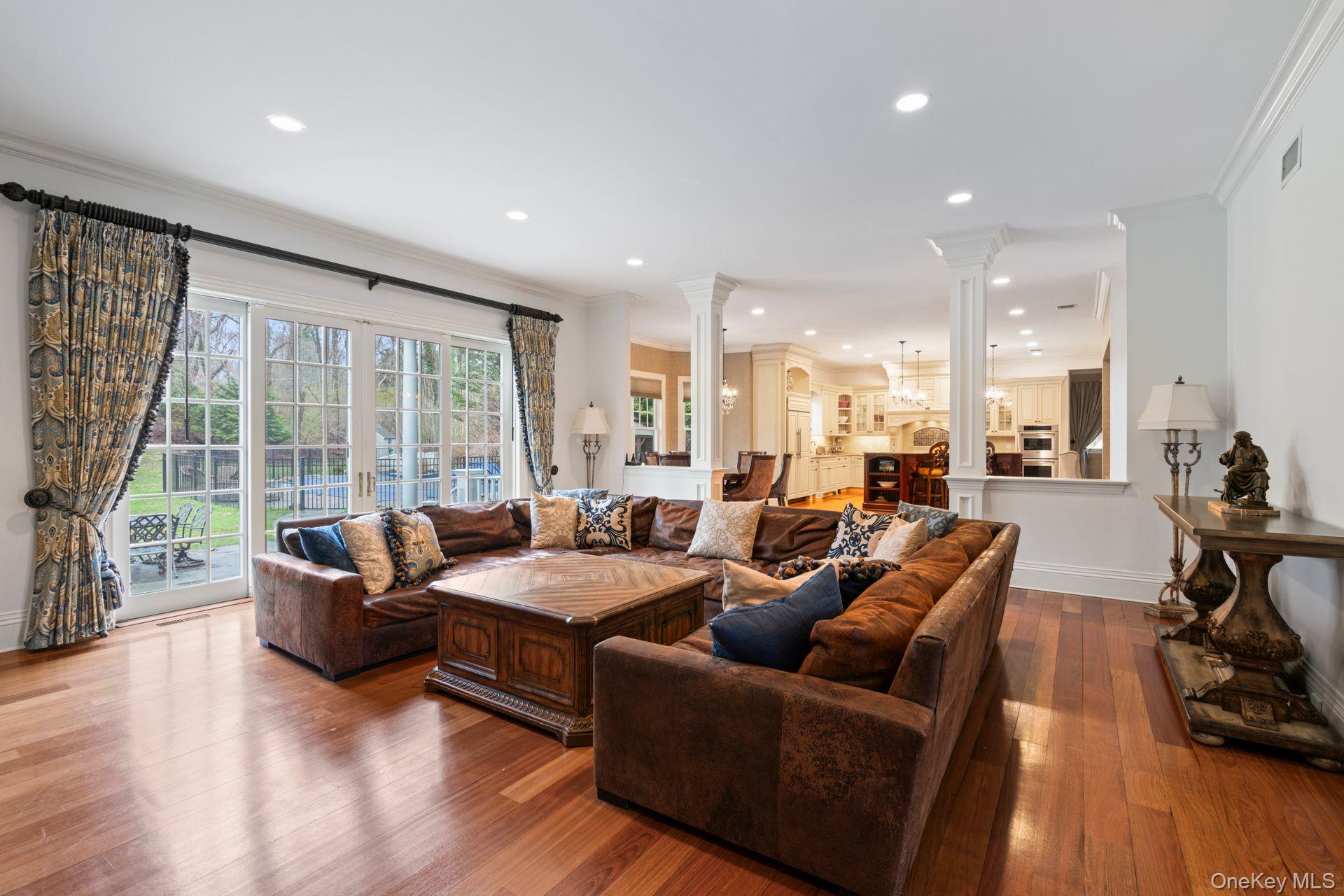 280 Southdown Road Lloyd Harbor, NY 11743 - Photo 10 of 39 a living room with furniture and a large window