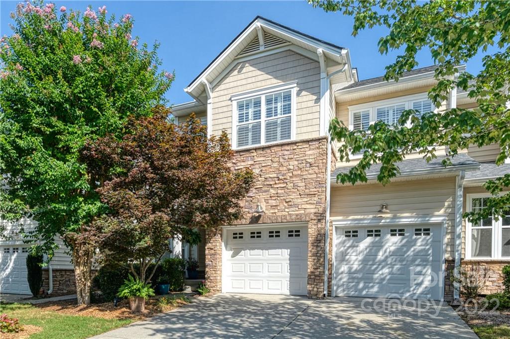 2086 Calloway Pines Drive Tega Cay, SC 29708 - Photo 1 of 47 a front view of a house with a yard