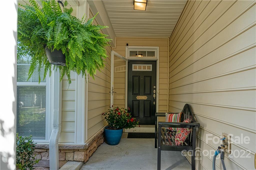 2086 Calloway Pines Drive Tega Cay, SC 29708 - Photo 3 of 47 a couple of potted plants in front of door