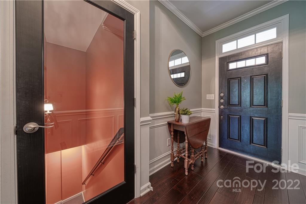 2086 Calloway Pines Drive Tega Cay, SC 29708 - Photo 5 of 47 a view of a dining room with furniture and wooden floor