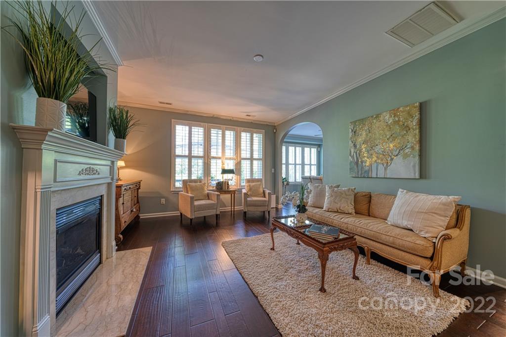 2086 Calloway Pines Drive Tega Cay, SC 29708 - Photo 6 of 47 a living room with furniture or couch and a fireplace