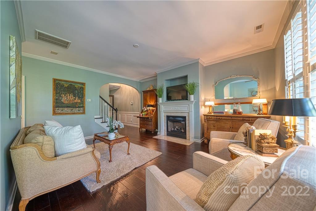 2086 Calloway Pines Drive Tega Cay, SC 29708 - Photo 9 of 47 a living room with furniture fireplace and a large window