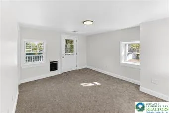 an empty room with windows