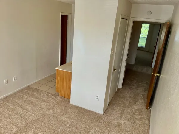 an entryway with a hallway