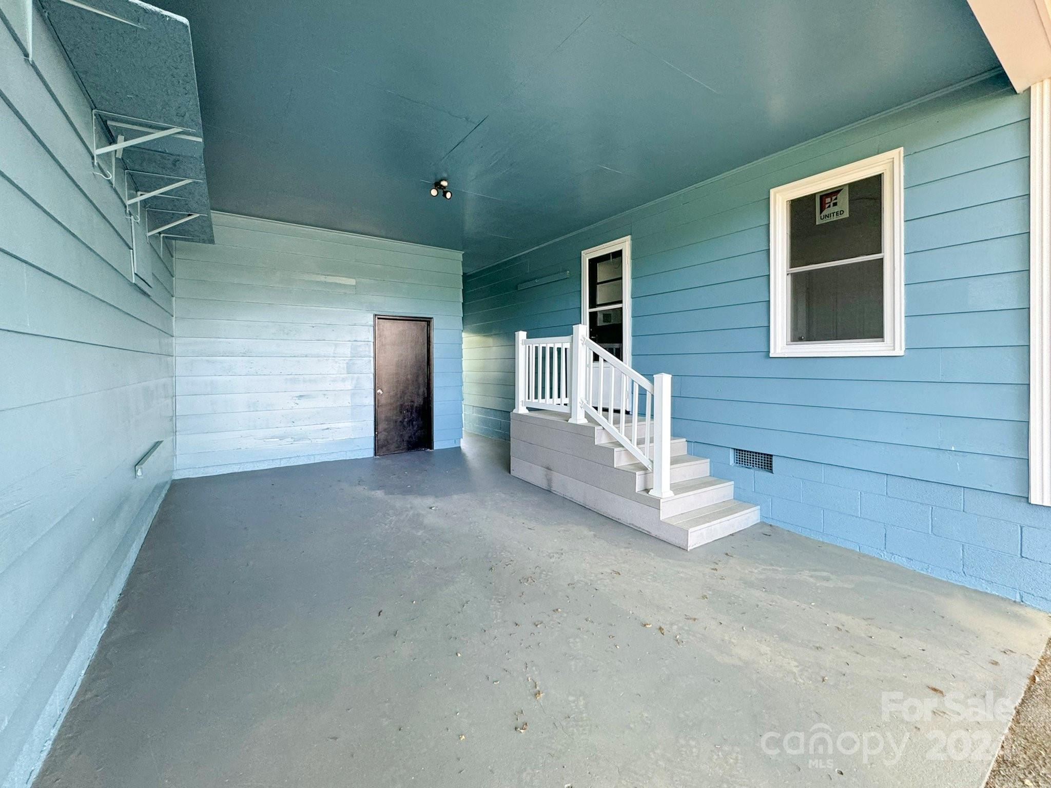 875 Marys Grove Road Cherryville, NC 28021 - Photo 23 of 28 a view of a house with a yard and garage