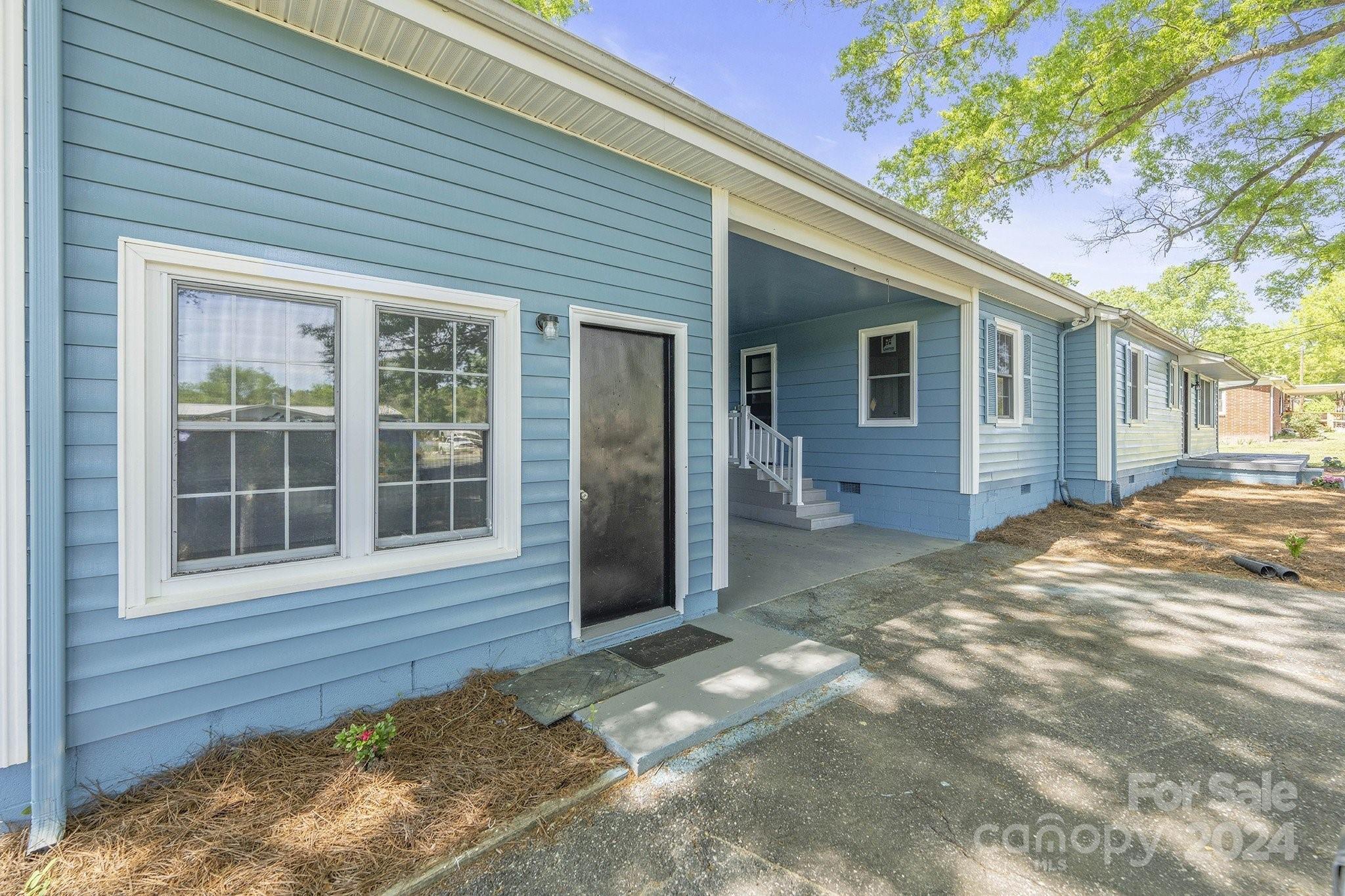 875 Marys Grove Road Cherryville, NC 28021 - Photo 24 of 28 a view of a house with a yard