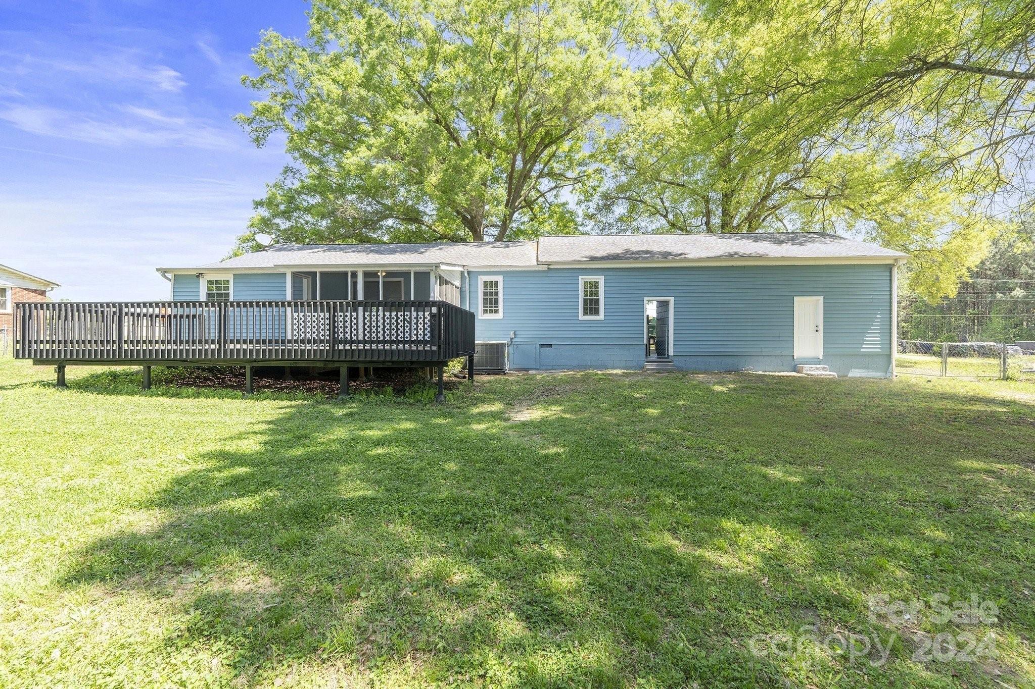 875 Marys Grove Road Cherryville, NC 28021 - Photo 4 of 28 a view of a house with a backyard