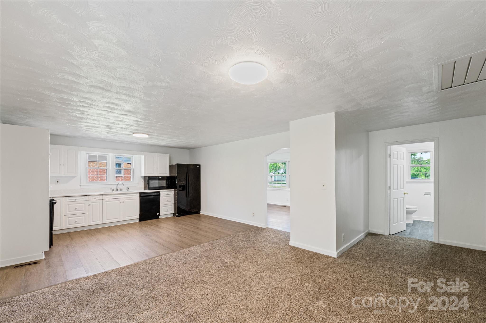 875 Marys Grove Road Cherryville, NC 28021 - Photo 7 of 28 a view of a kitchen with refrigerator and window