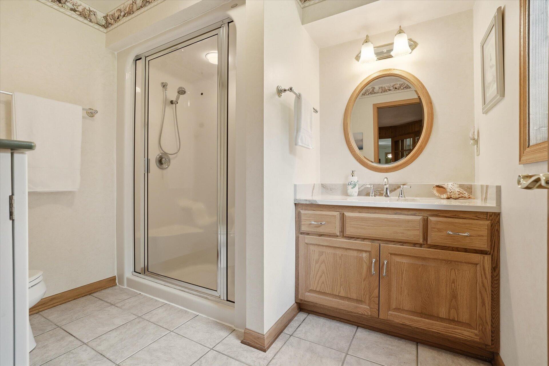 W330-s1417 County Rd C Delafield, WI 53018 - Photo 29 of 39 Located off of the hot tub room is a full bathroom w/Steam Shower