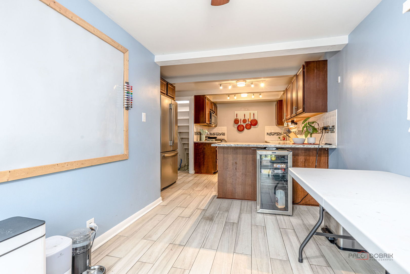 516 North Emroy Avenue Elmhurst, IL 60126 - Photo 14 of 35 a kitchen with a sink and wooden floor