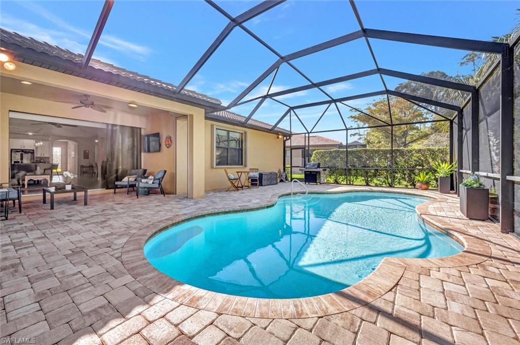10874 Dennington Road Fort Myers, FL 33913 - Photo 27 of 40 Welcome to the oversized saltwater pool. 3743 total sq ft of total living space.