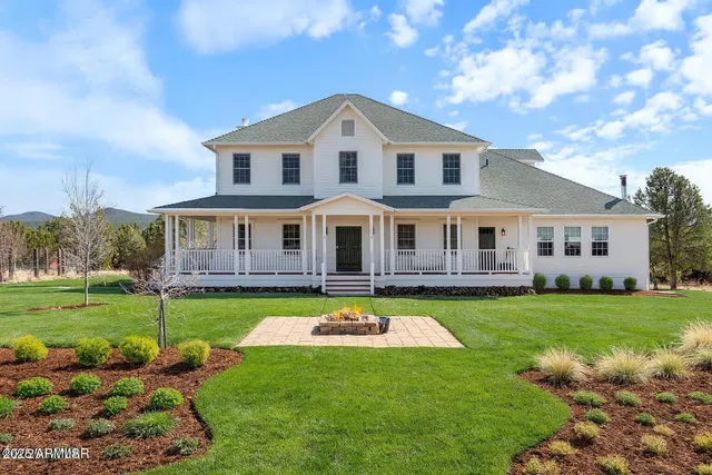 a view of a balcony with wooden floor