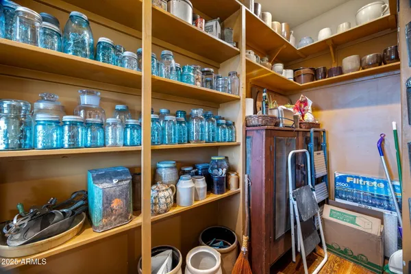 a bathroom with a sink vanity toilet and shower