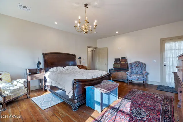 a bathroom with a sink a mirror and a toilet