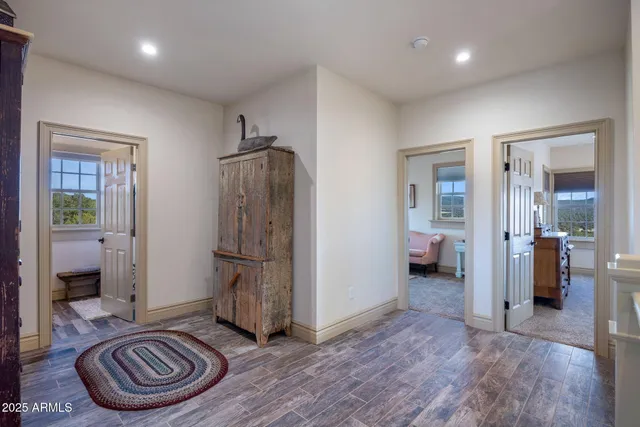 a front view of a house with a yard and balcony