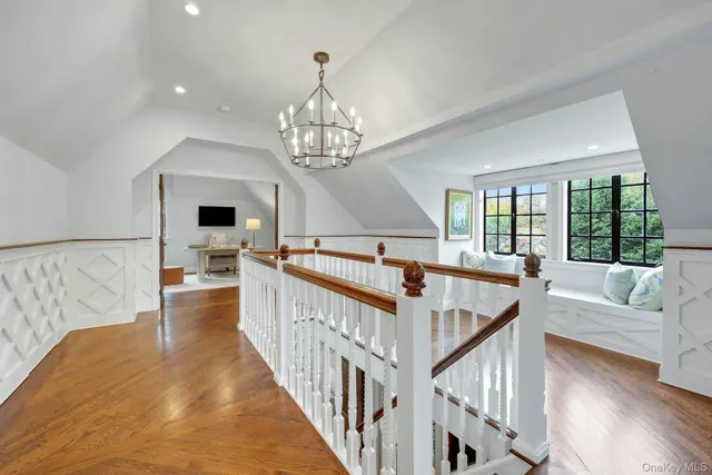 a dining room with a table and chairs