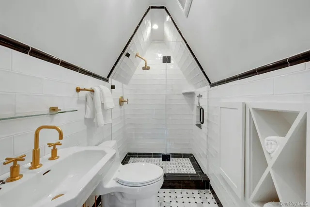 a bedroom with furniture and flat screen tv