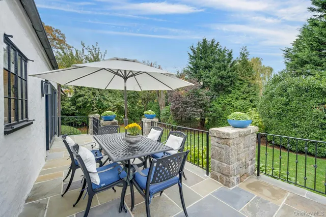 a view of a terrace with furniture