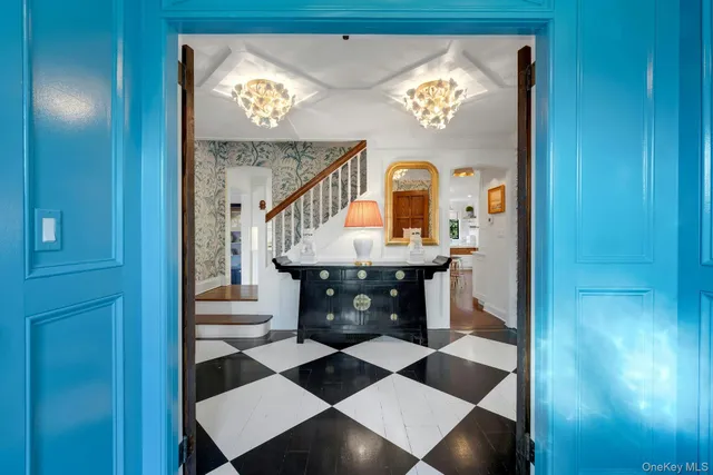 a view of entryway with a front door