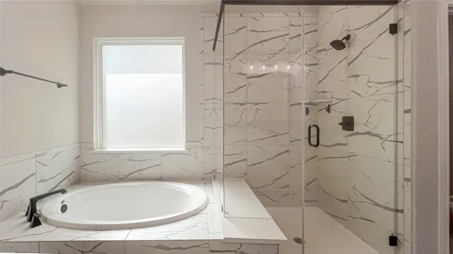 a bathroom with a sink and a shower