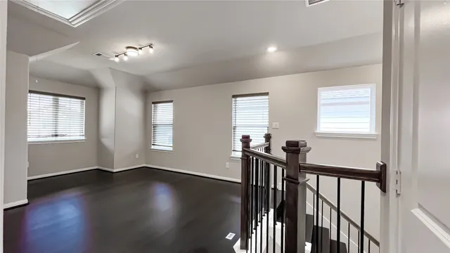 a view of entryway with wooden floor
