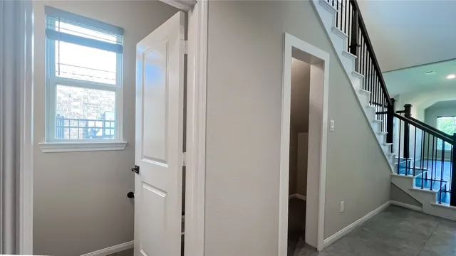 a view of an entryway with staircase