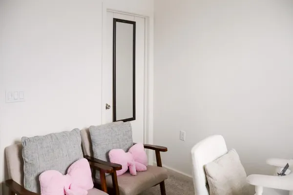 a front view of a house with a garage