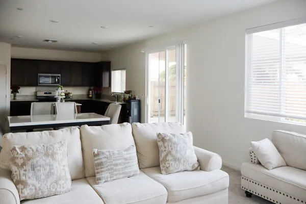 a view of a dining room with furniture and a livingroom