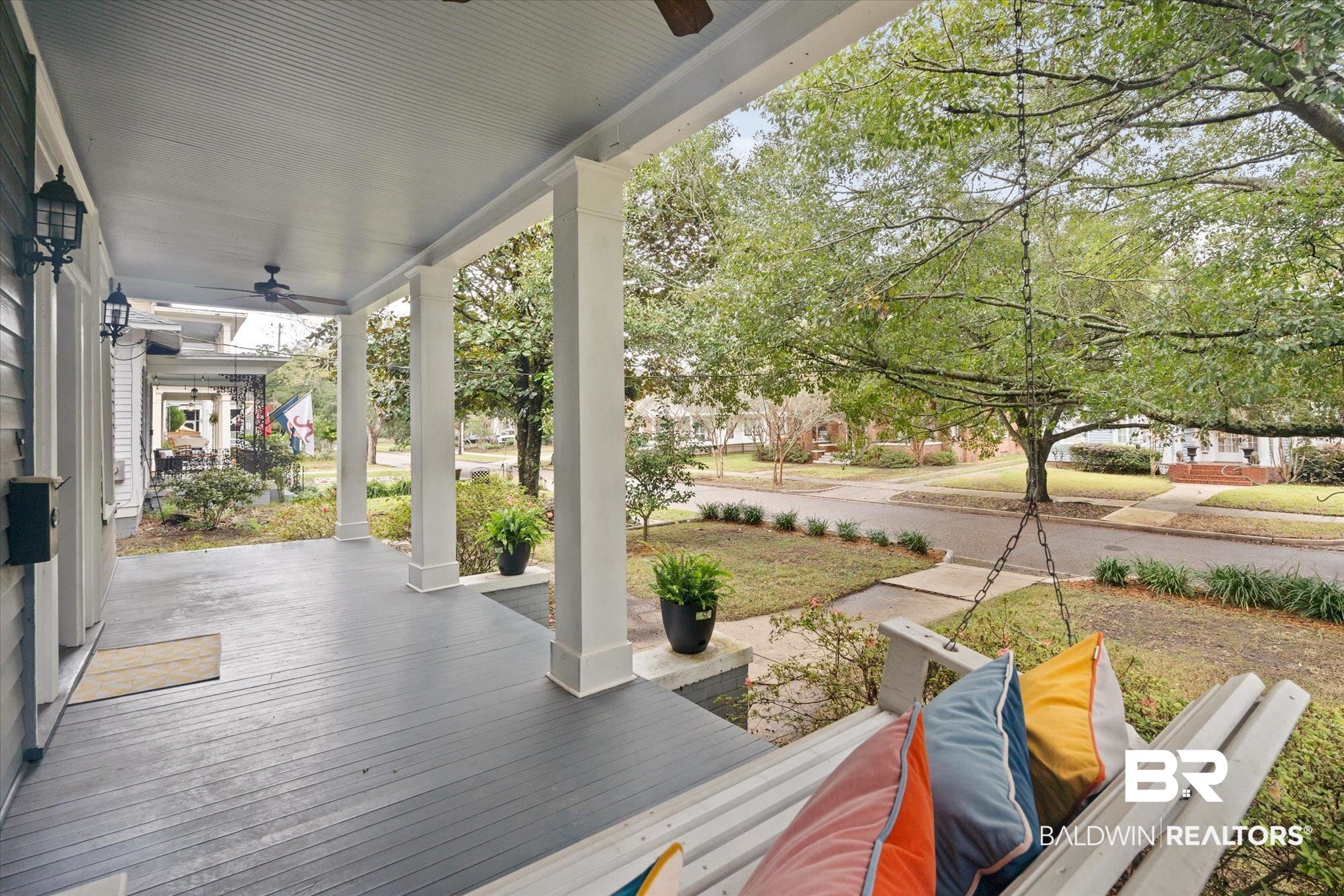 14 South Monterey Street Mobile, AL 36604 - Photo 2 of 41 Wooden terrace featuring covered porch and ceiling fan