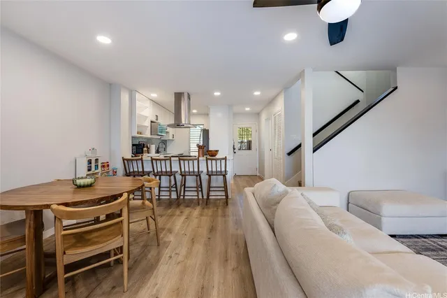a living room with furniture and a table