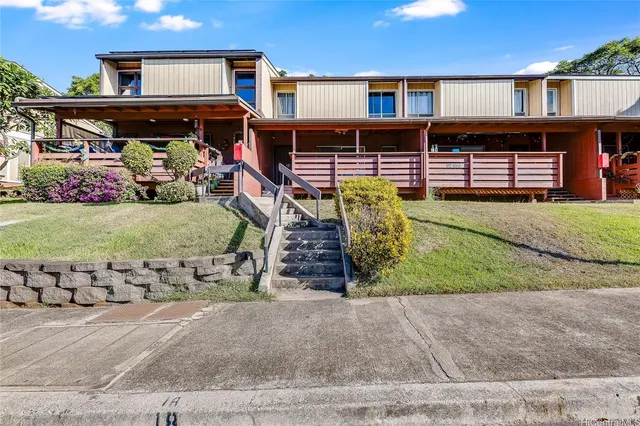 front view of a house with a street
