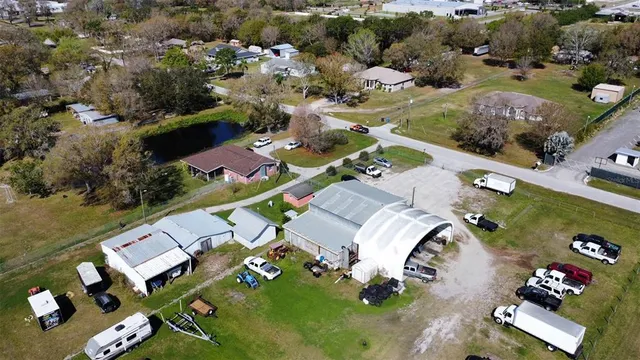 an aerial view of a house with a garden
