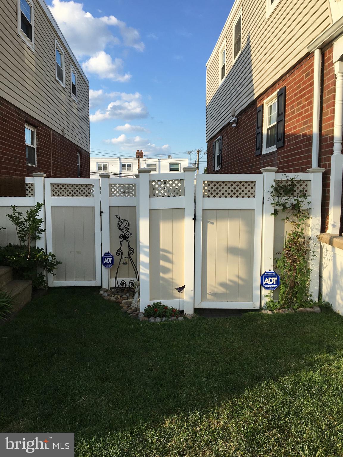 3405 Holyoke Road Philadelphia, PA 19114 - Photo 41 of 51 Exterior Front Gate Entry, to Side & Back Yard