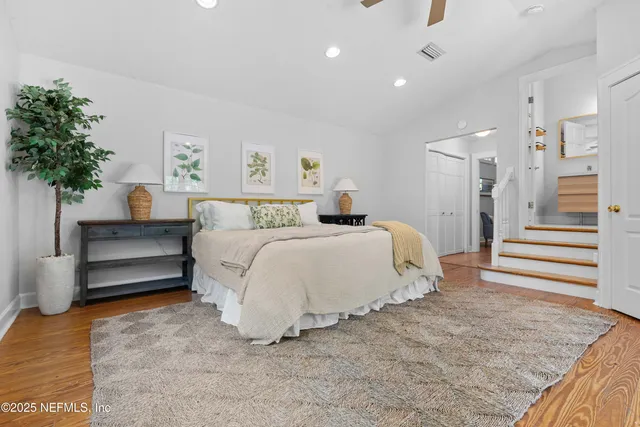 a bed room with a bed and a couch