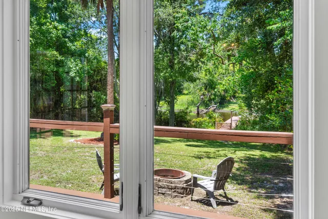 a view of backyard from deck