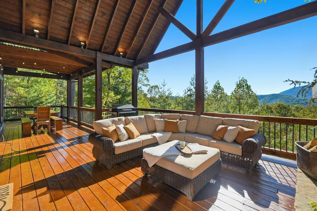 249 Settlement Road Epworth, GA 30541 - Photo 25 of 43 a balcony with furniture and wooden floor
