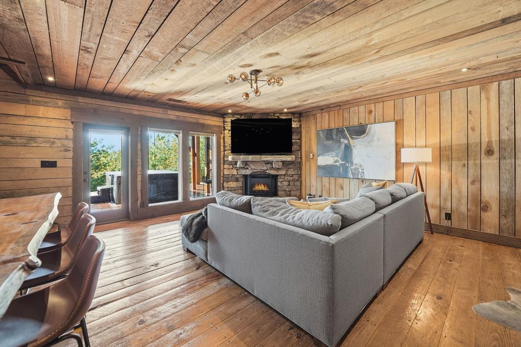 249 Settlement Road Epworth, GA 30541 - Photo 32 of 43 a living room with furniture and a flat screen tv