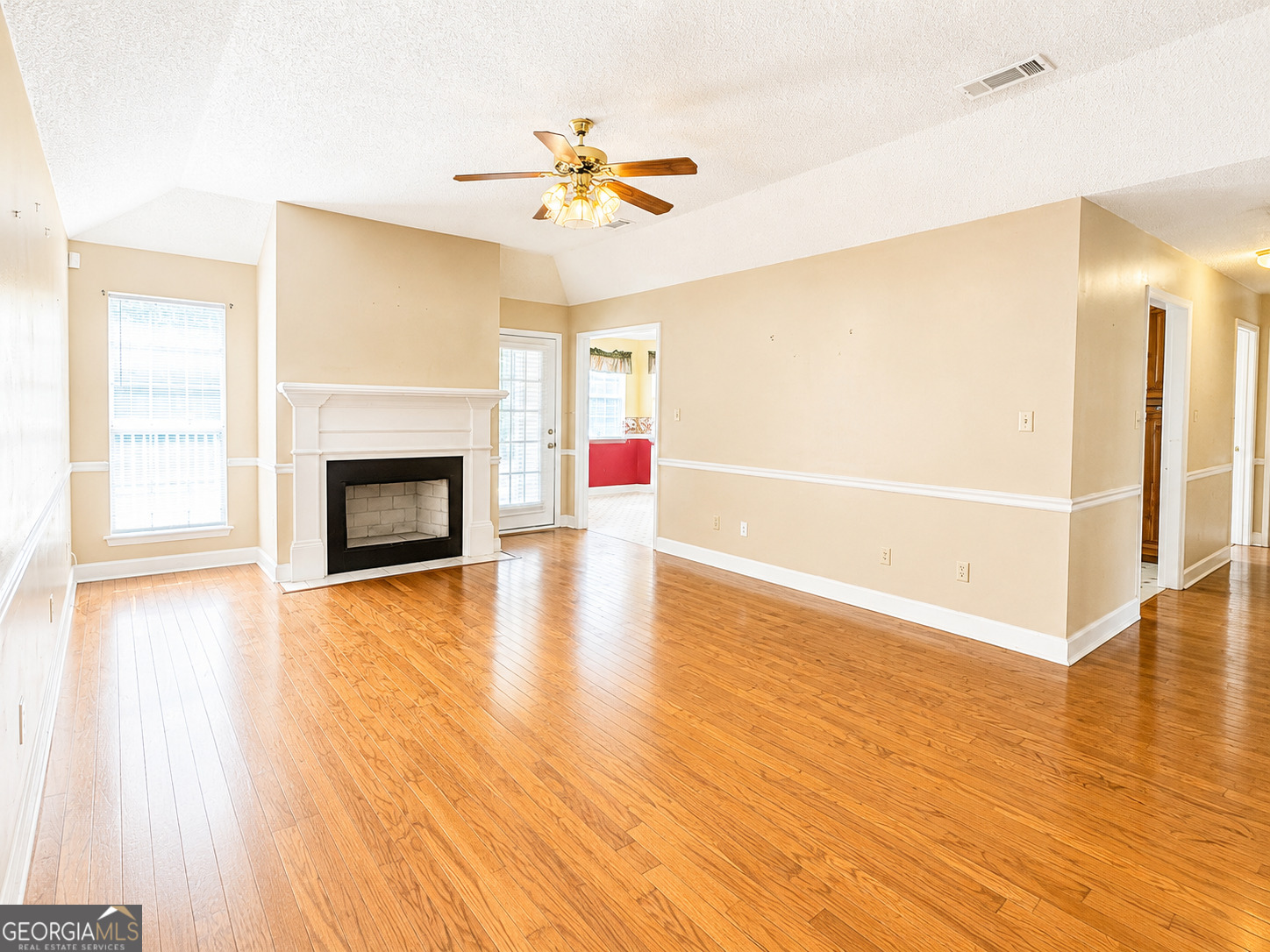 959 Lovers Lane Road Leesburg, GA 31763 - Photo 4 of 19 a view of livingroom with hardwood floor and a ceiling fan