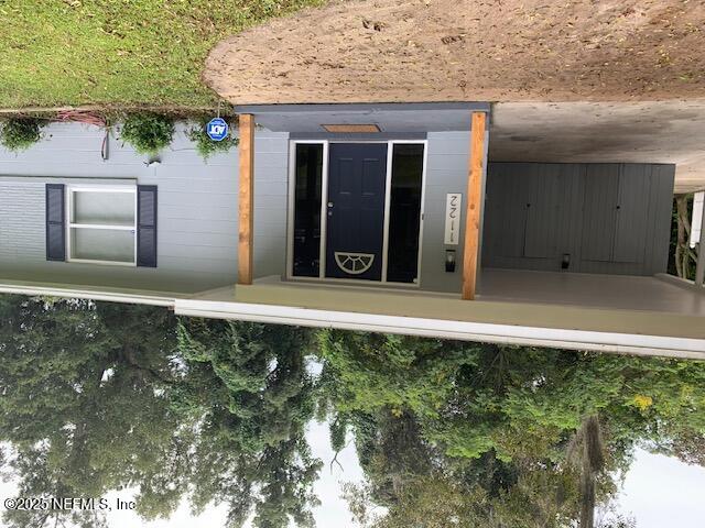 a view of a entryway door front of house