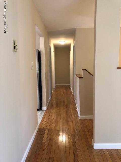 707 Dotters Corner Road Kunkletown, PA 18058 - Photo 8 of 18 a view of a hallway with wooden floor