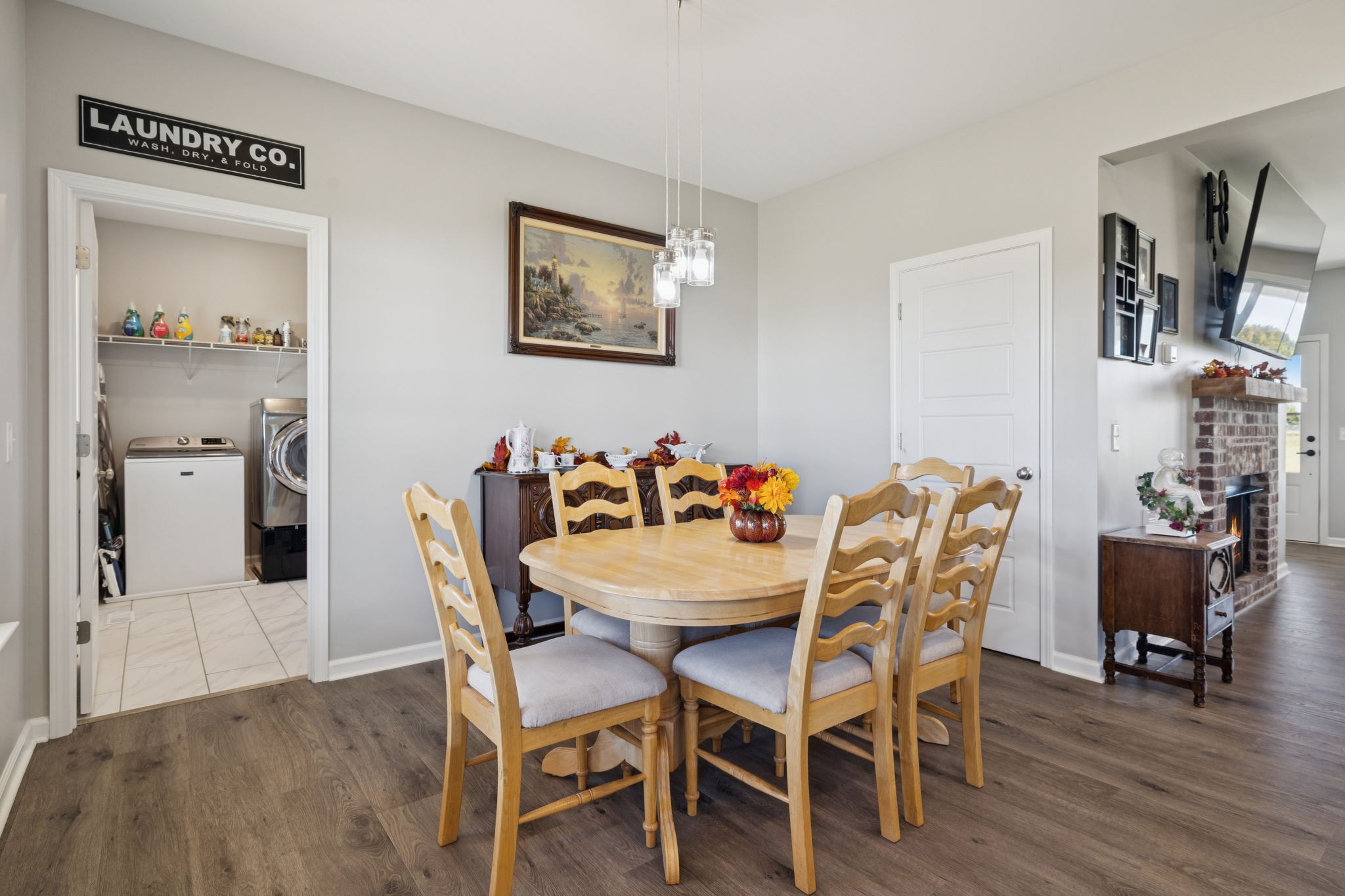 5373 East Robertson Road Orlinda, TN 37141 - Photo 24 of 57 a view of a dining room with furniture and wooden floor