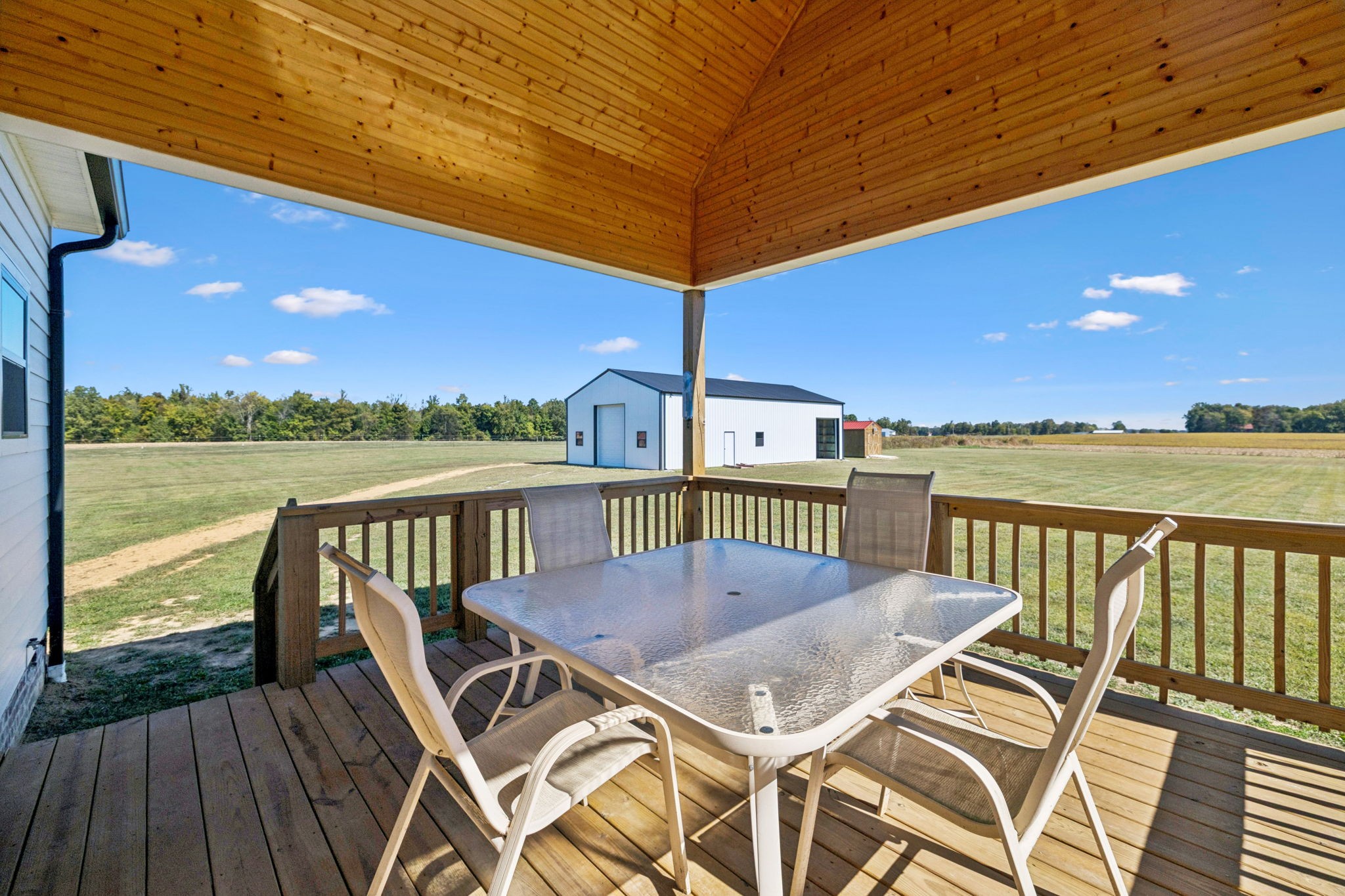 5373 East Robertson Road Orlinda, TN 37141 - Photo 27 of 57 a view of a balcony with wooden floor and outdoor space