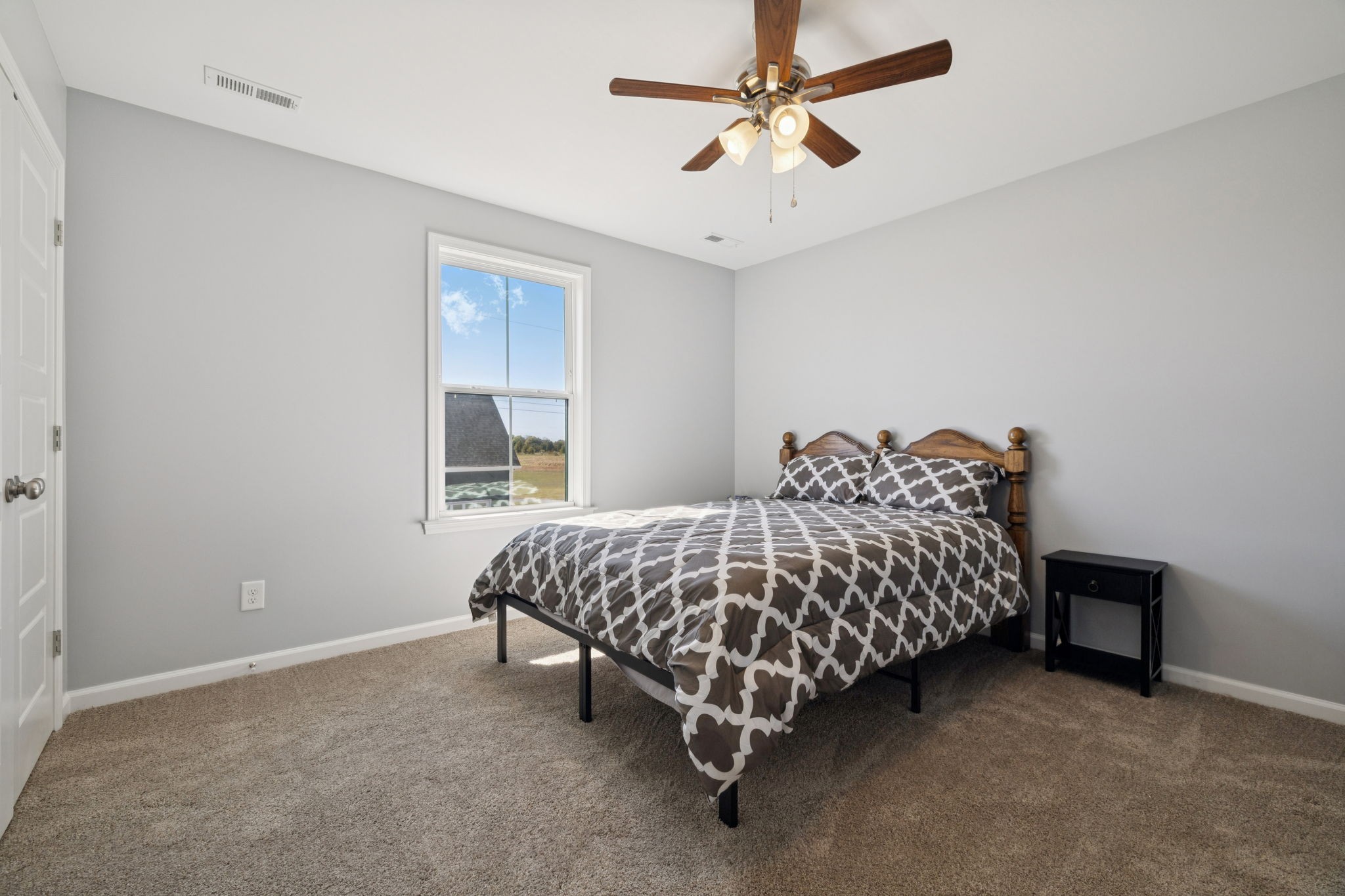 5373 East Robertson Road Orlinda, TN 37141 - Photo 38 of 57 a bedroom with a bed and a ceiling fan