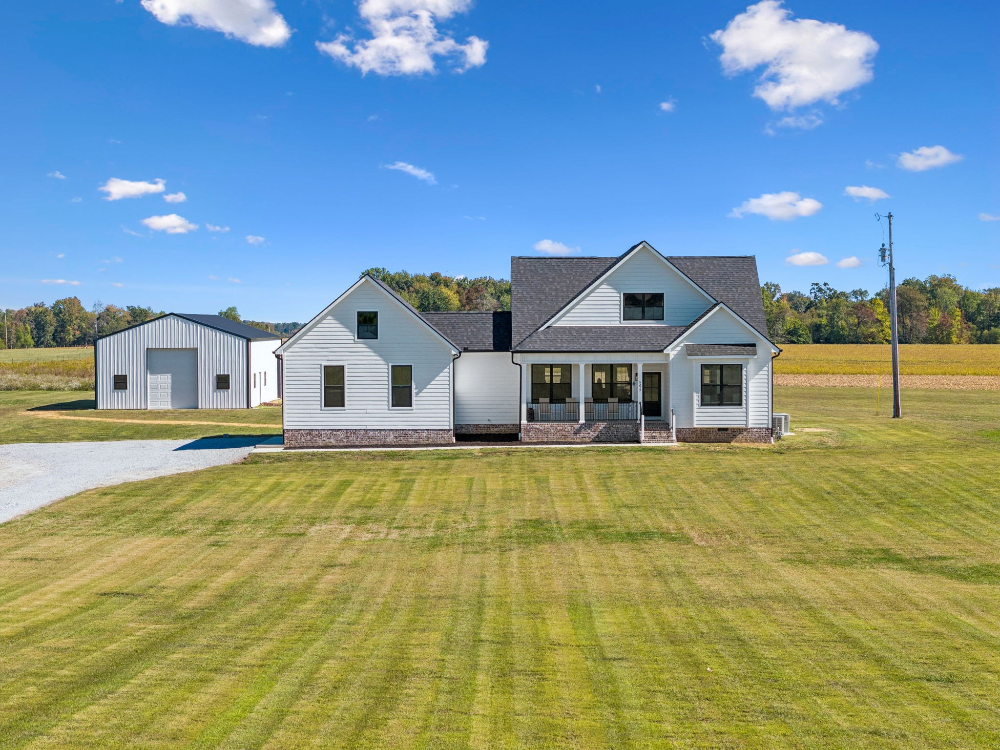 5373 East Robertson Road Orlinda, TN 37141 - Photo 50 of 57 a front view of a house with swimming pool