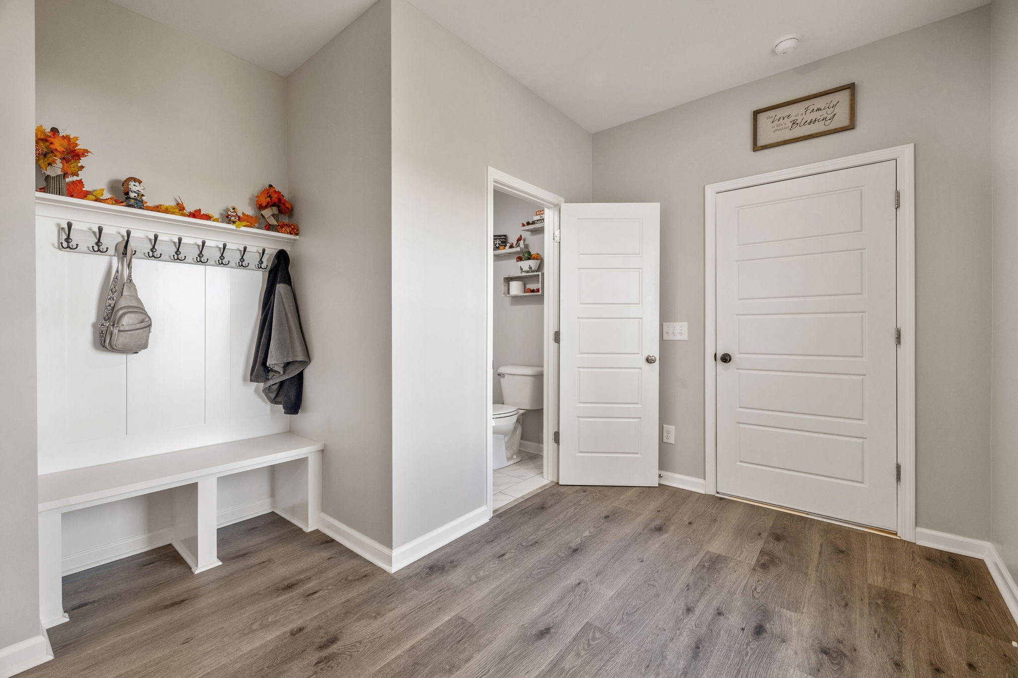 5373 East Robertson Road Orlinda, TN 37141 - Photo 9 of 57 a view of walk in closet with wooden floor and cabinet