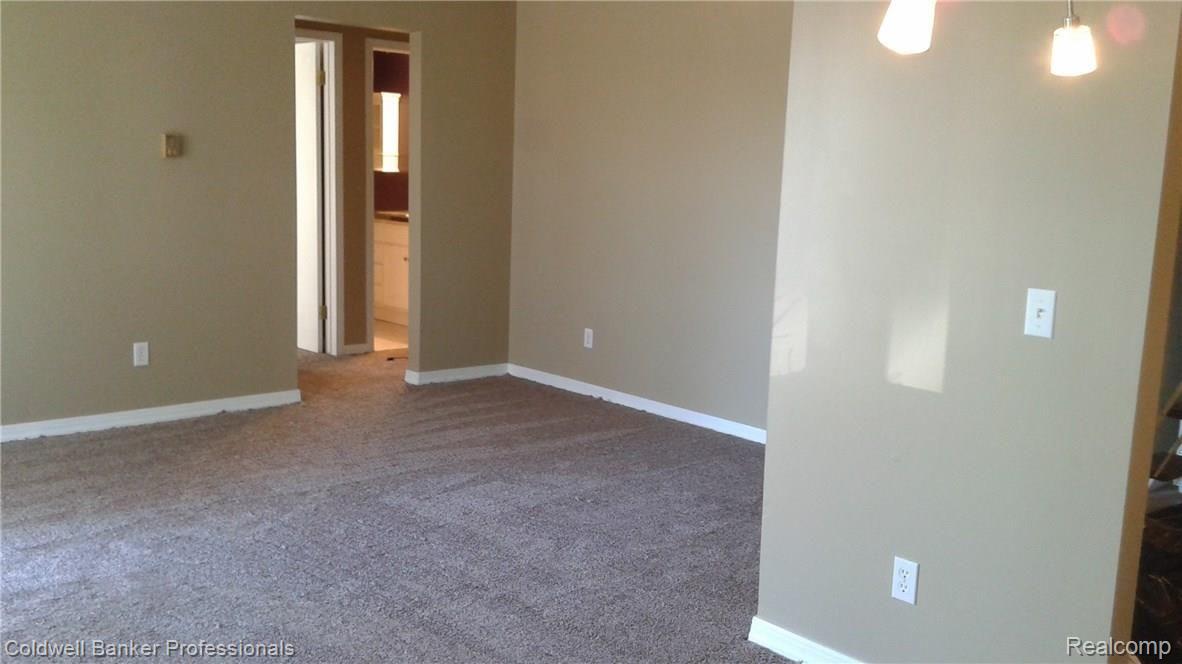32005 Twelve Mile Road, Unit 207 Farmington, MI 48334 - Photo 6 of 15 Bright living room