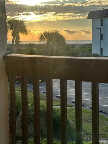 a view of an ocean from a balcony