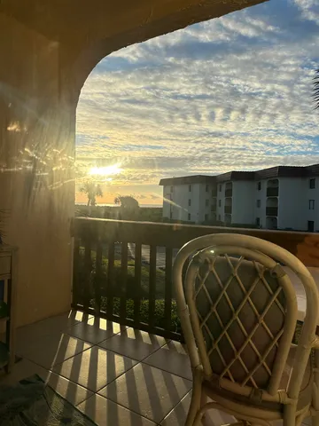 a view of an ocean from a balcony